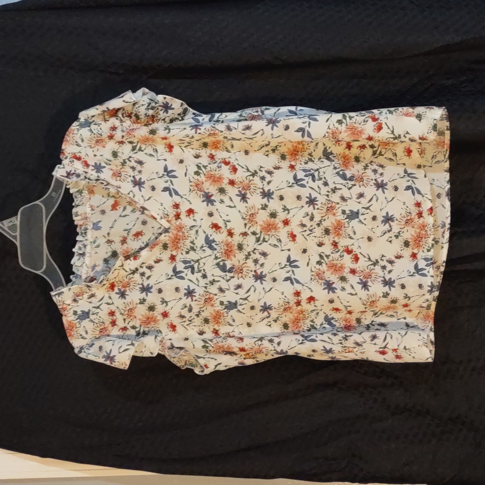 Woman's sleeveless floral blouse